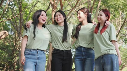 Happy Asian volunteer and portrait of people in park for charity event, community service and teamwork. Volunteering, happy women with smile for donation. 