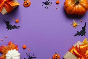 Halloween holiday decorations including gift boxes, pumpkins, spiders, bats on color background