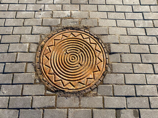 Iron round manhole to underground sewer outlet