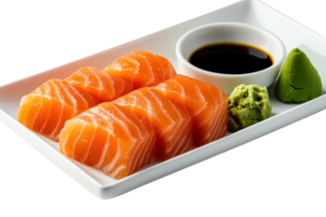 Fresh salmon sashimi served on white plate with soy sauce and wasabi, showcasing vibrant colors and textures