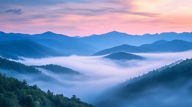 Misty Mountain Majesty at Sunrise: A Breathtaking Panoramic View of Serene Peaks and Rolling Fog