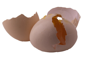 cracked egg with yolk and shell on white background.