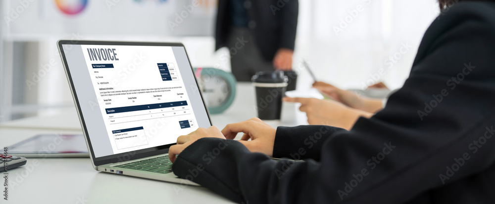 Poster invoice on computer screen from accounting application. computer program for financial and budget of