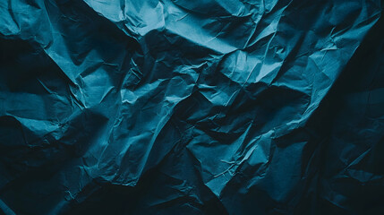 Obraz premium Crumpled dark blue paper texture background; design element