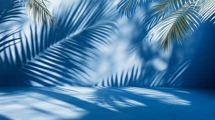 Fototapeta premium Tropical abstract design showcasing shadows of palm leaves Summer concept. Palm tree shadow on a blue background.