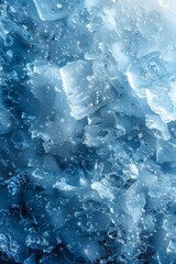 Obraz premium Frozen Ice Cubes with Water Droplets and Blue Tinted Background