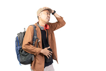 Young Indonesian male traveler looking disappointed and angry while traveling, travel concept, isolated on white background.