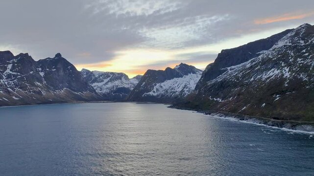 flight over the moody winter landscape of the Bergsbotn Bay,  part of the Northfjord on Senja Island, in Northern Norway
