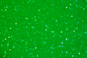 A light green bokeh-style background with defocused light creates an elegant space for text or design elements.