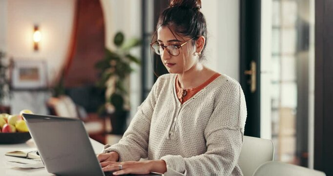 Laptop, typing and woman in home office for remote work, research or author writing story for article. Computer, serious freelancer or reading online, proofreading or creative editing for publishing