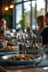 Coworkers having business lunch in restaurant, closeup