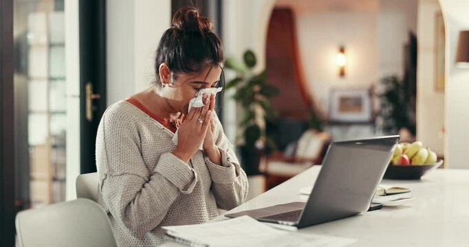 Laptop, freelance and sick woman sneeze with flu, cold or viral infection in kitchen. Remote work, lady and online in home with allergy, virus or burnout with sinusitis or hayfever with typing