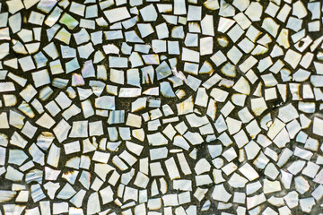 delicate blue-green abstract background with small mosaic. Surfaces in a modern interior