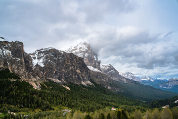Mount Tofana di Rozes seen from the Falzarego Pass on a cloudy day.