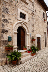Fototapeta premium The wonderful medieval town of Castel del Monte, nestled in the Abruzzo mountains during autumn, once the tourist season is over