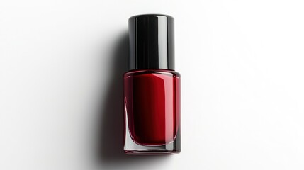 Obraz premium Elegant Red Nail Polish Bottle on White Background