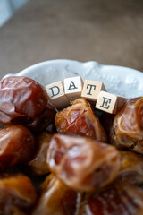 dried fresh dates on a plate macro shot