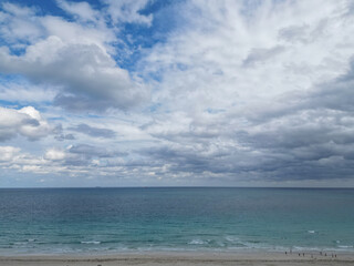 Romantic summer vacation view on seascape. Sea horizon view. Cloudy sky and seascape at summer vacation. Skyscape with sea horizon. Clear water. Calm horizon view at sea nature. Majestic view