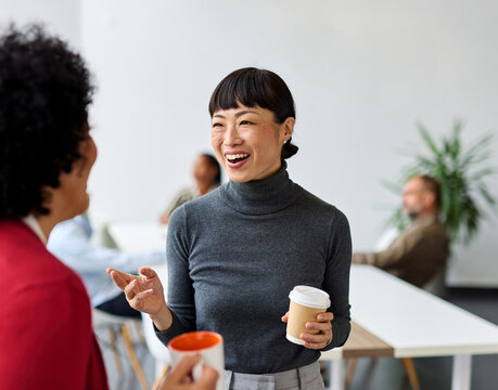 business meeting businesswoman woman young office presentation colleague teamwork standing walking conference seminar break coffee