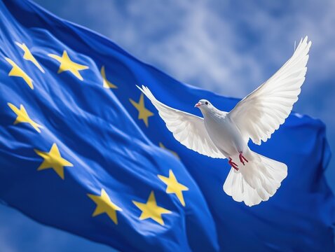 European Union Flag with White Dove of Peace Against Blue Sky