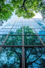 Sustainble green building Ecofriendly building Sustainable glass office building with tree for reducing carbon dioxide Office with green environment Corporate building reduce CO2 Safet