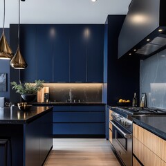 Modern kitchen interior featuring navy cabinets and gold pendant lights