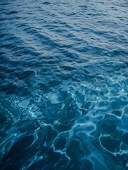 Obraz premium Abstract blue water texture background, perfect for digital designs or water-themed visuals.