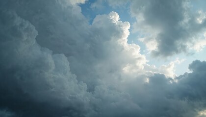 Fototapeta premium Dramatic cloudscape with grey rain clouds covering heaven. Ominous storm sky view with turbulent dark atmosphere. Background for stormy weather forecast, climate change visuals, extreme weather