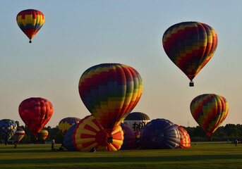 Colorful hot air balloons take off during the festival.