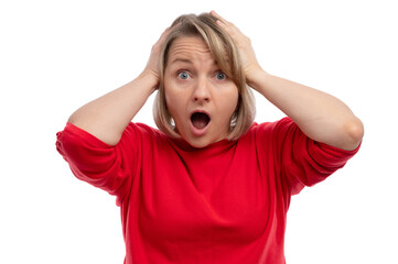 A surprised woman with short hair holding her head in disbelief against a white background.