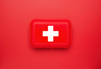 First Aid Kit on red