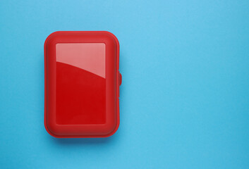 Plastic box on a blue