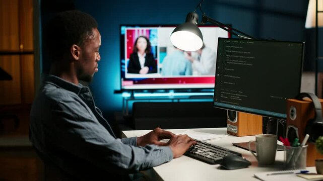 Developer enters binary data on terminal panel while he establishes html code. Software engineer working from home on troubleshooting with programming language, encryption. Camera B.