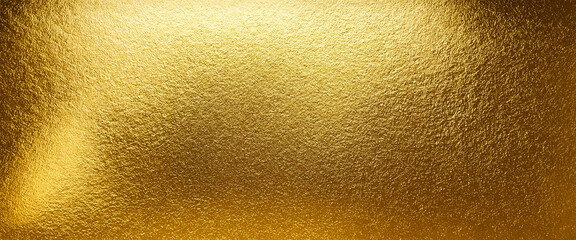Naklejka premium shiny textured gold surface with a polished finish for a luxurious and elegant design background in a warm metallic glow