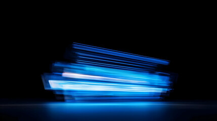 Abstract Light Painting With Blue Streaks and Motion Blur on a Dark Background