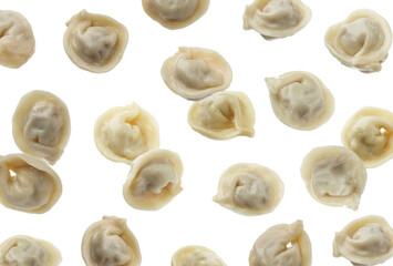 Tasty boiled dumplings (pelmeni) falling on white background