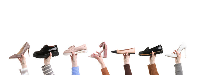 Women holding different shoes in hands on white background, closeup