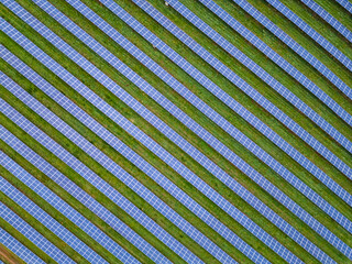Aerial view of solar panels in a solar power plant, in Forest of Dean, England, United Kingdom