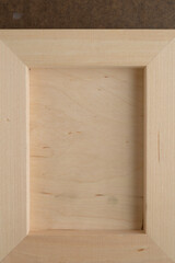 back of a wooden panel featuring wood frame