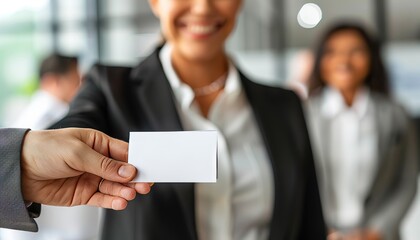 Networking event  professionals engaging and exchanging business cards for future collaborations