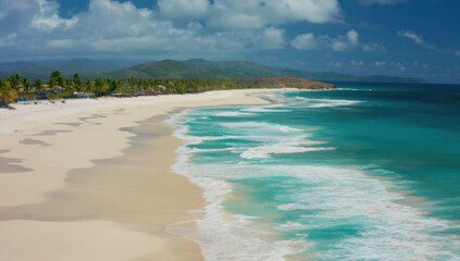 Fototapeta premium Seaside Serenity: a picturesque aerial view of a serene beach. the turquoise ocean meet the sandy shore. Lush greenery, under a partly cloudy sky, creates a beautiful scene.