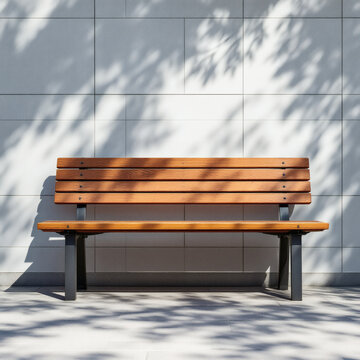 Sunny Day Park Bench Wooden Seat, Metal Legs, Tile Wall Background, Relaxation, Nature, Outdoor, Serene, Tranquil