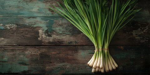 Freshly Harvested Scallions Arranged Neatly on a Rustic Wooden Table Surface with a Rich Textured Background