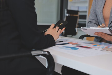 Accounting company provide finance and taxation planning for profitable cash flow, Auditor and accountant team working in office, analyze financial data and accounting record with calculator.Insight