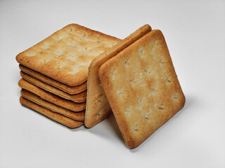 some pieces of crackers biscuits on a white background