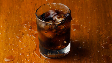 Splashing Ice in Refreshing Cola Drink