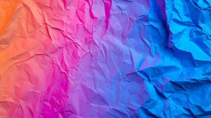 Obraz premium Textured Abstract Background Of Colorful Crumpled Creased Paper With Gradient Ombre In Pink Purple And Blue