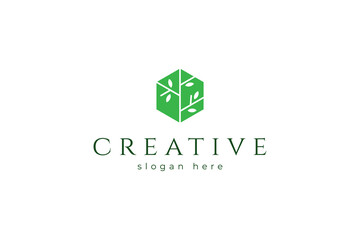 tree logo in green color hexagonal shape in flat design style
