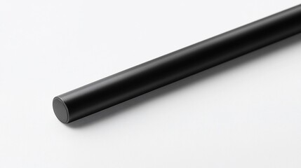 Black Cylindrical Object on White Background: A Minimalist Product Photography
