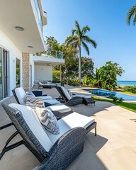 Oceanfront villa patio lounge chairs